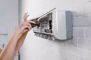 cropped-shot-of-repairman-taking-off-filter-from-c-YTWMSHK-scaled-1-1024×684